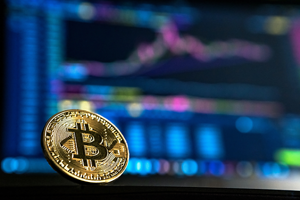 Bitcoin: Monetary Solution or Societal Problem?
